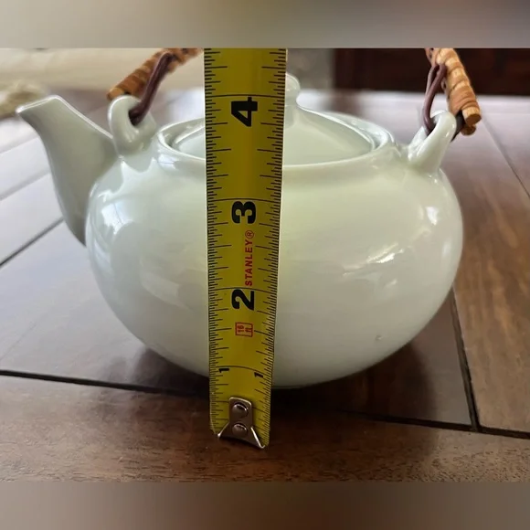Elegant Ceramic Teapot with Woven Handle